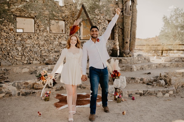 A joyful couple celebrating their anniversary in a picturesque setting.