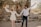 A satisfied couple celebrating the sale of their house.