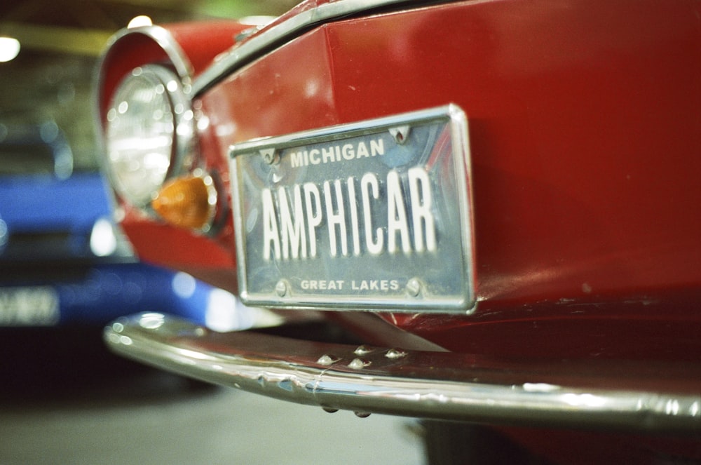 a michigan license plate on the front of a classic car