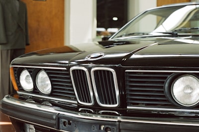 A close-up of car-themed accessories paired with stylish apparel.
