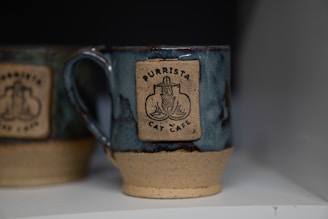A vibrant display of custom mugs featuring adorable pet illustrations.