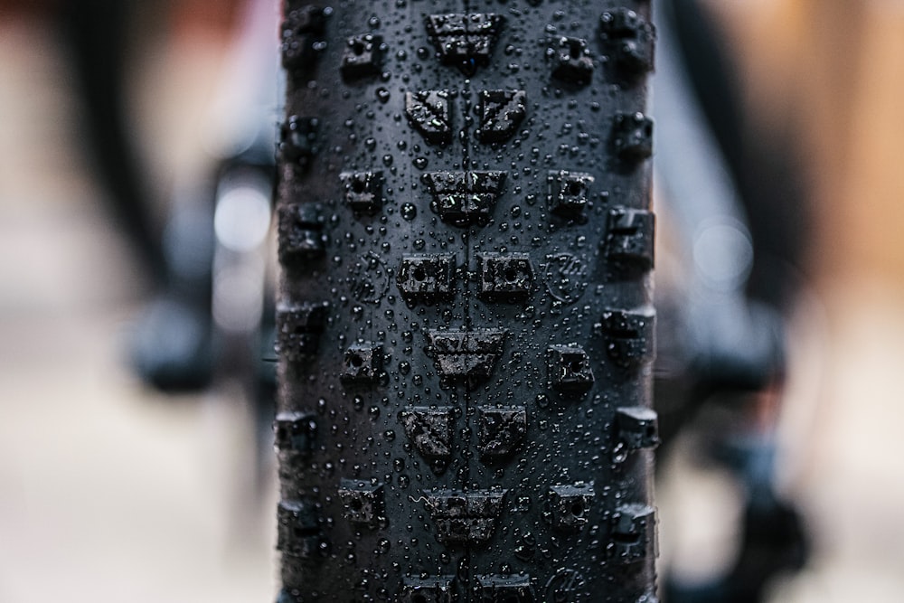 a close up of a black bike tire