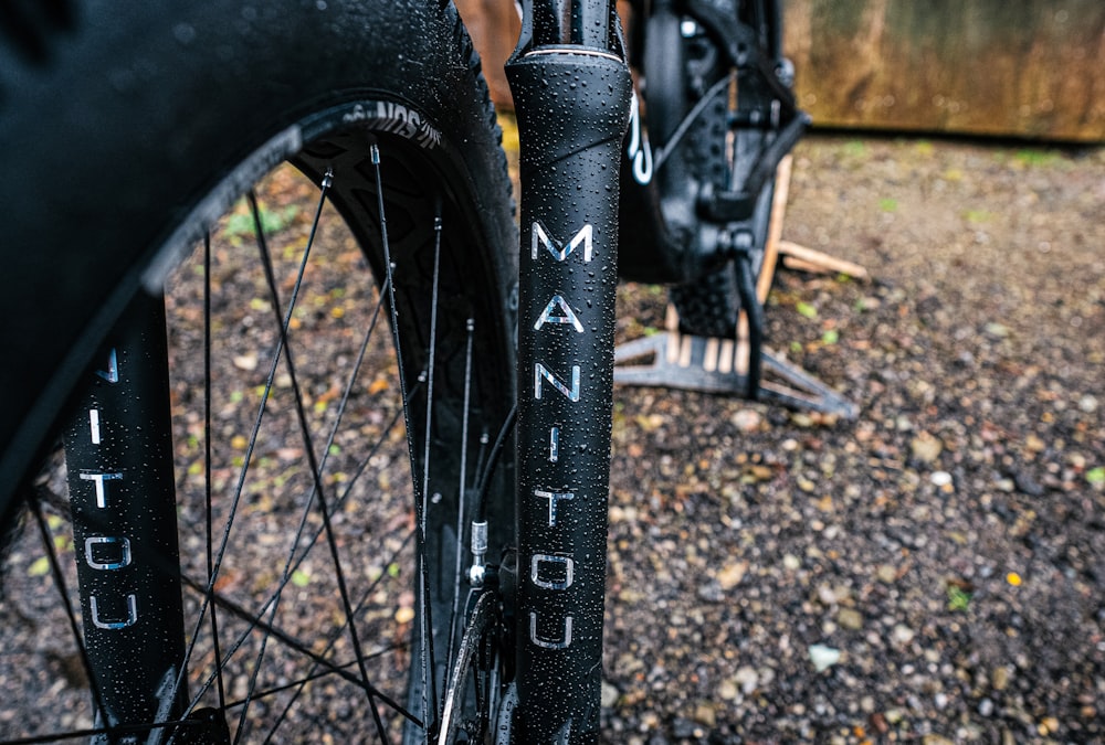 a close up of a bike tire and spokes