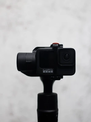 A sleek snapgo360 camera set against a minimalist white background, highlighting its premium design.