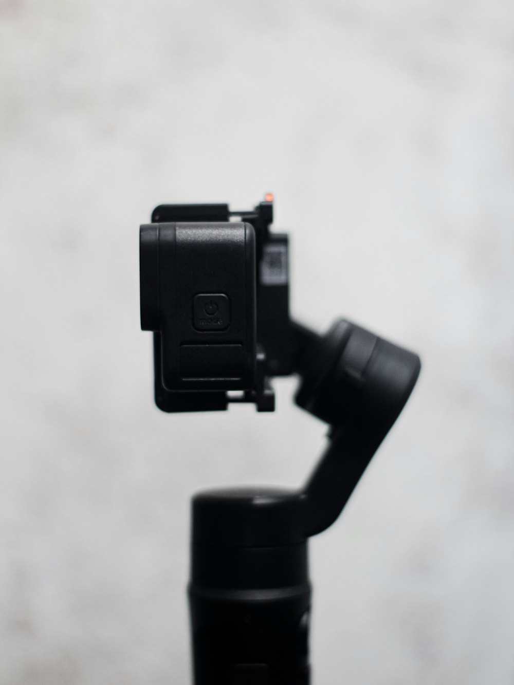 a small camera attached to a tripod