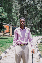 Smiling patient walking confidently after physiotherapy session outdoors