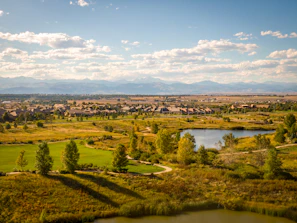 A scenic view of a developed neighborhood with parks.