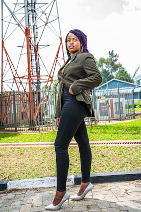 A woman walking confidently in versatile footwear outdoors.