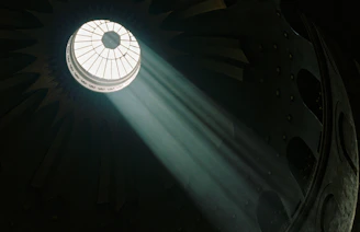 Sunlight streaming through a spotless veranda glass roof.