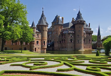 a castle with a maze in front of it
