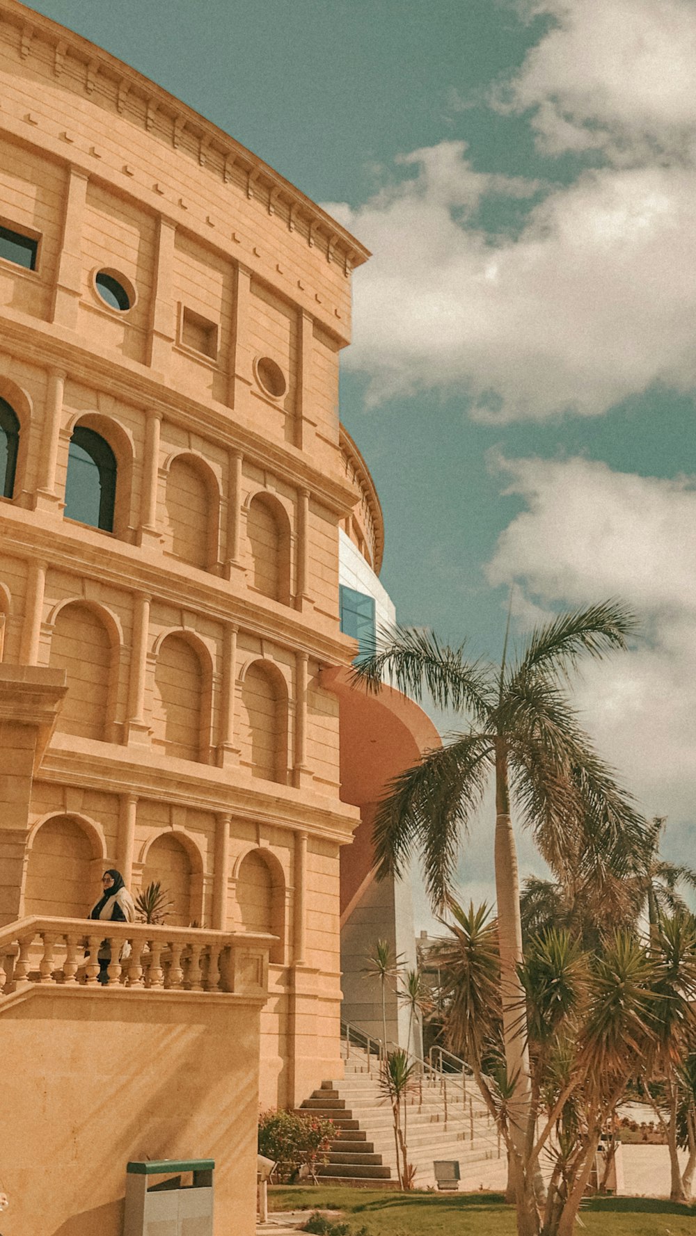 a tall building with a clock on the side of it