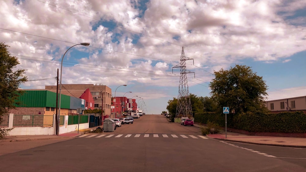 a street with cars parked on the side of it