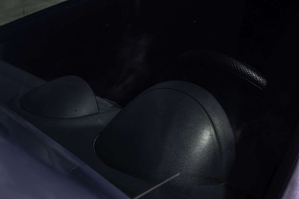 the interior of a car with the door open