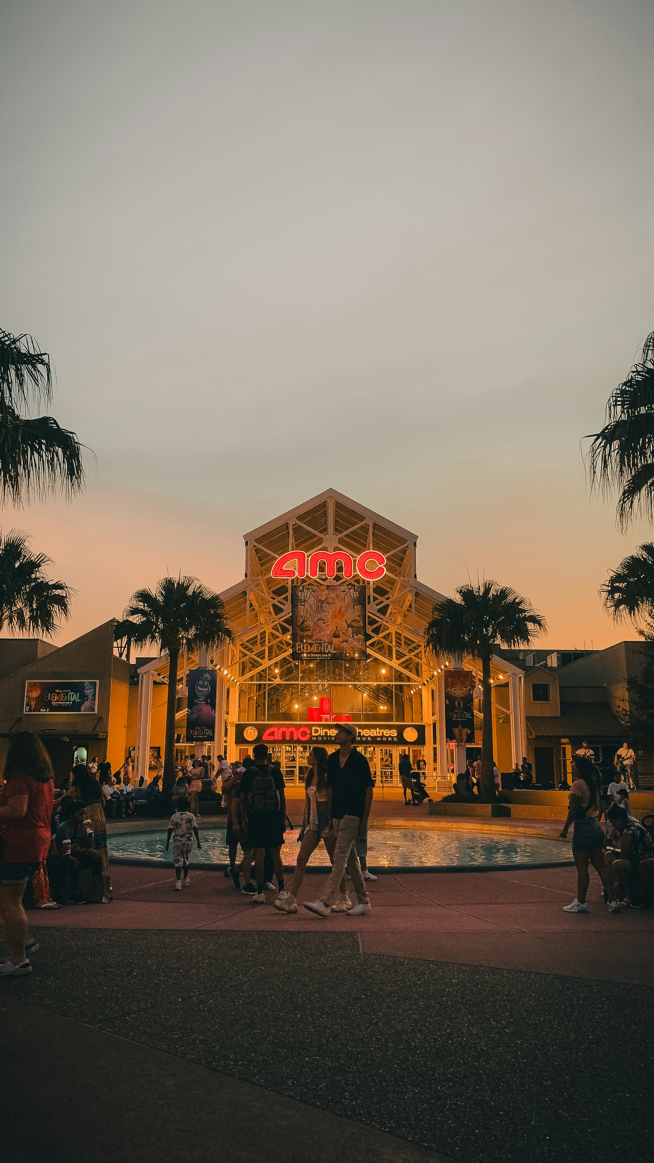 a group of people standing in front of a building