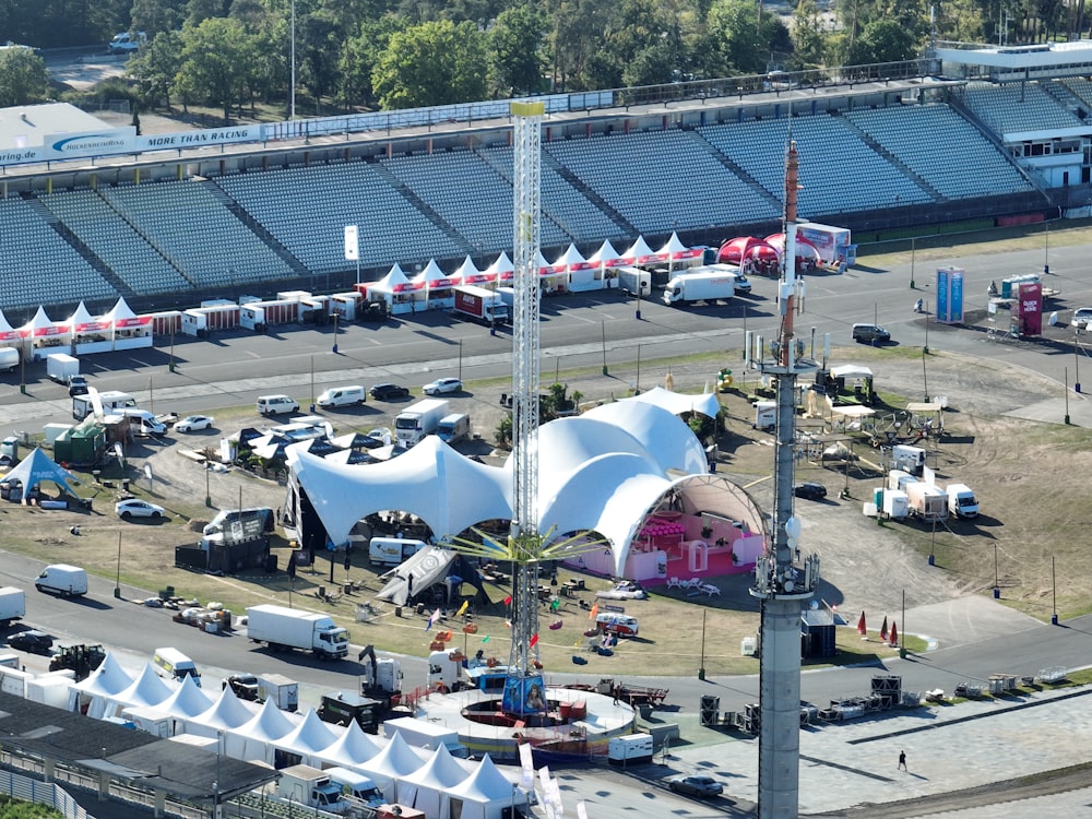 an aerial view of a carnival with tents and tents