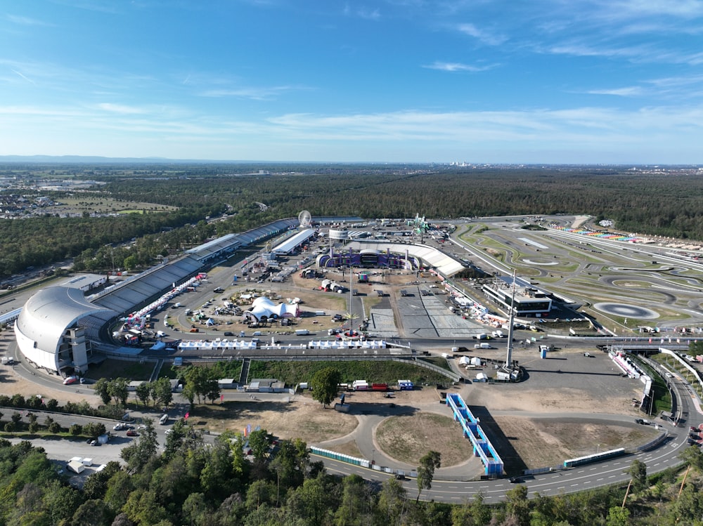 an aerial view of an airport with a lot of vehicles