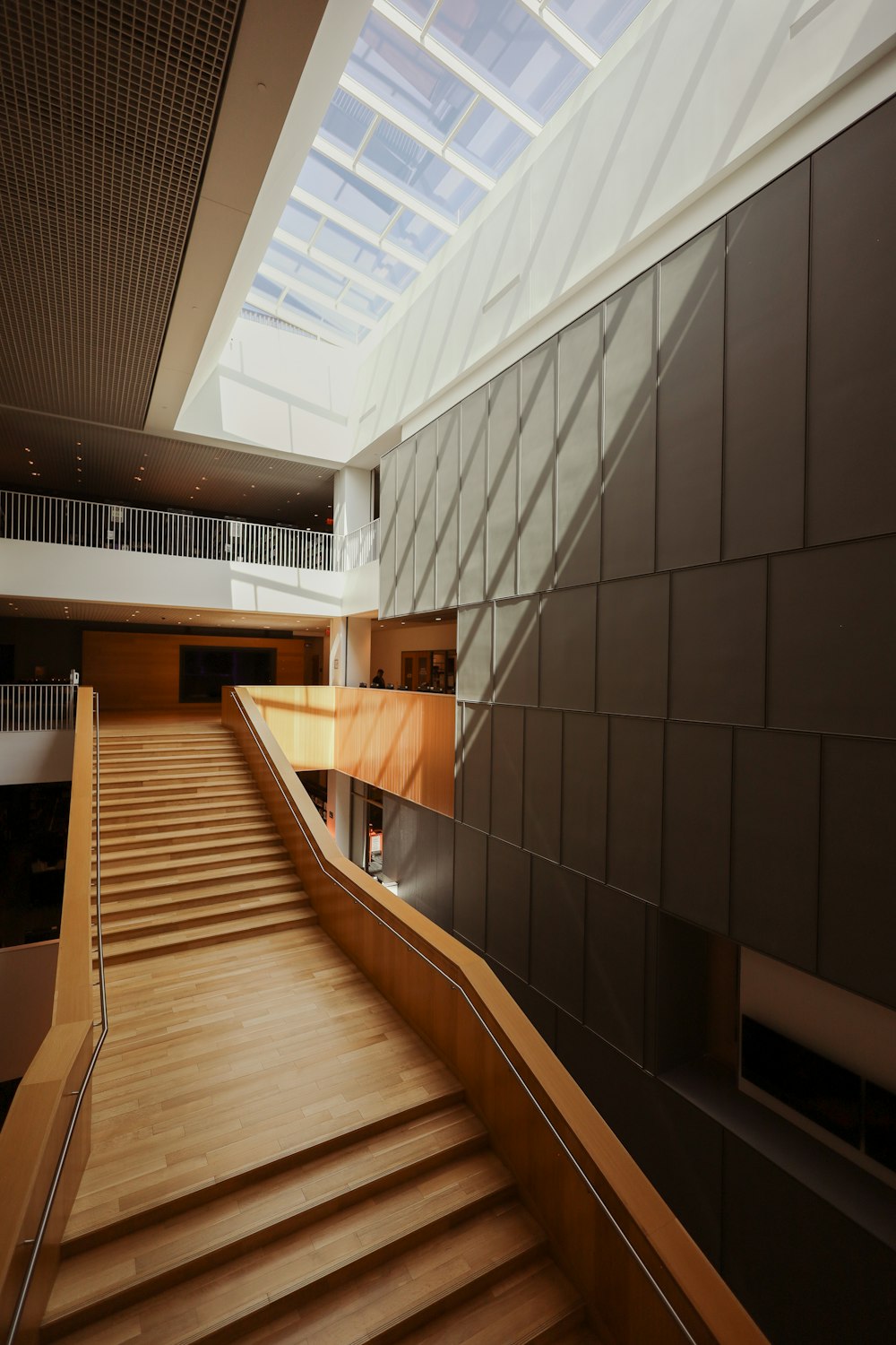 a large staircase with a skylight above it