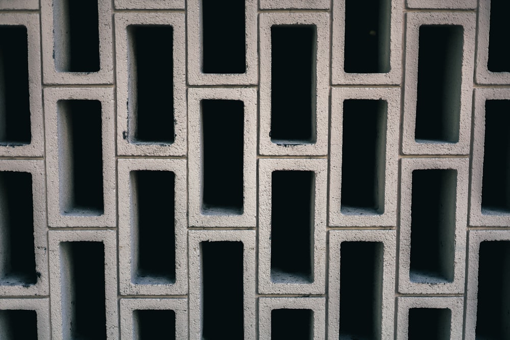 a close up of a wall made of cement blocks