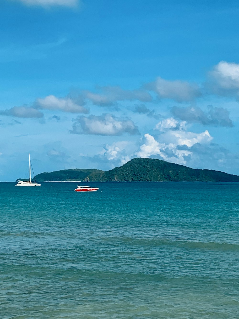 a sailboat in the middle of a large body of water