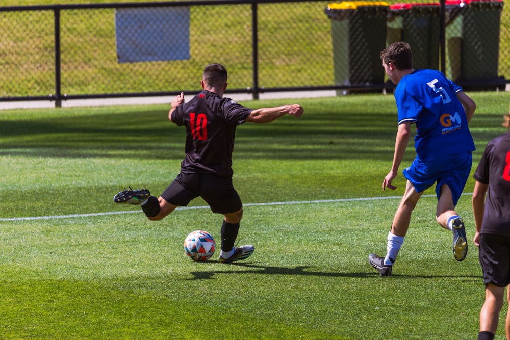 a group of young men playing a game of soccer