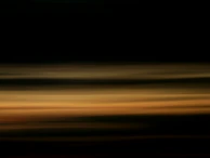 Abstract patterns of static and stripes overlaying a murky, muddy brown background.