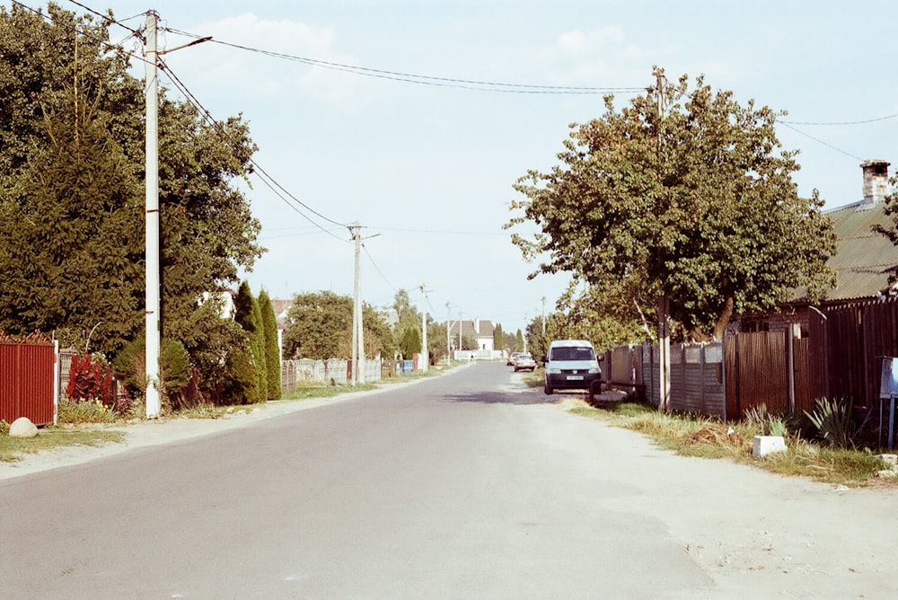 a van is parked on the side of the road