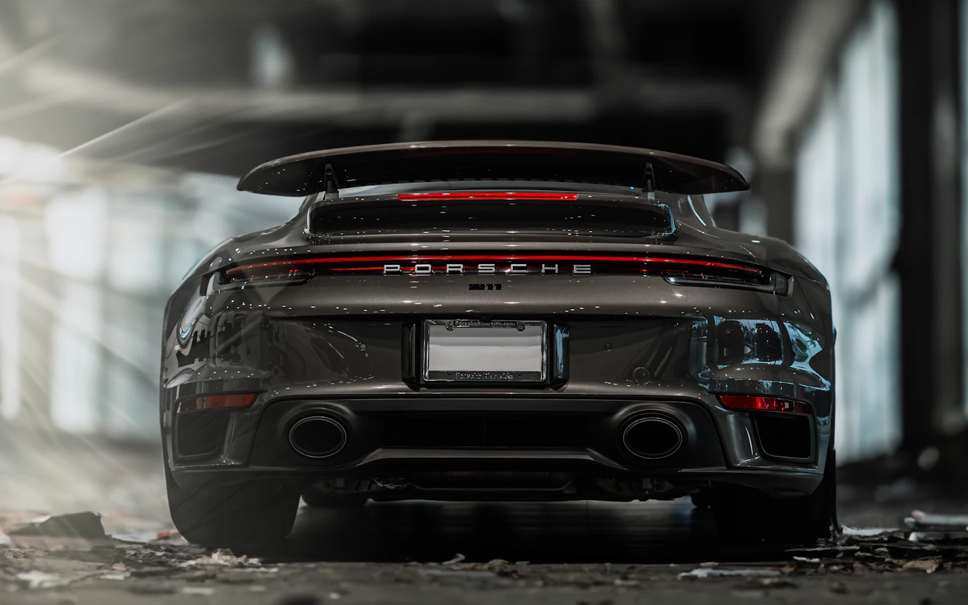 A 911 Turbo under the raking light of the workshop