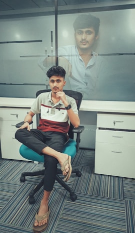 Portrait of Khalid Zerouali in a modern office setting, focused and approachable.