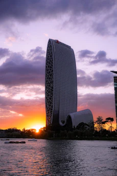 A beautiful modern skyscraper in Dubai at sunset