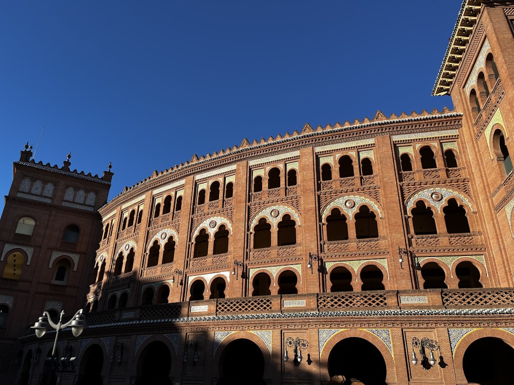 a large brick building with a clock tower