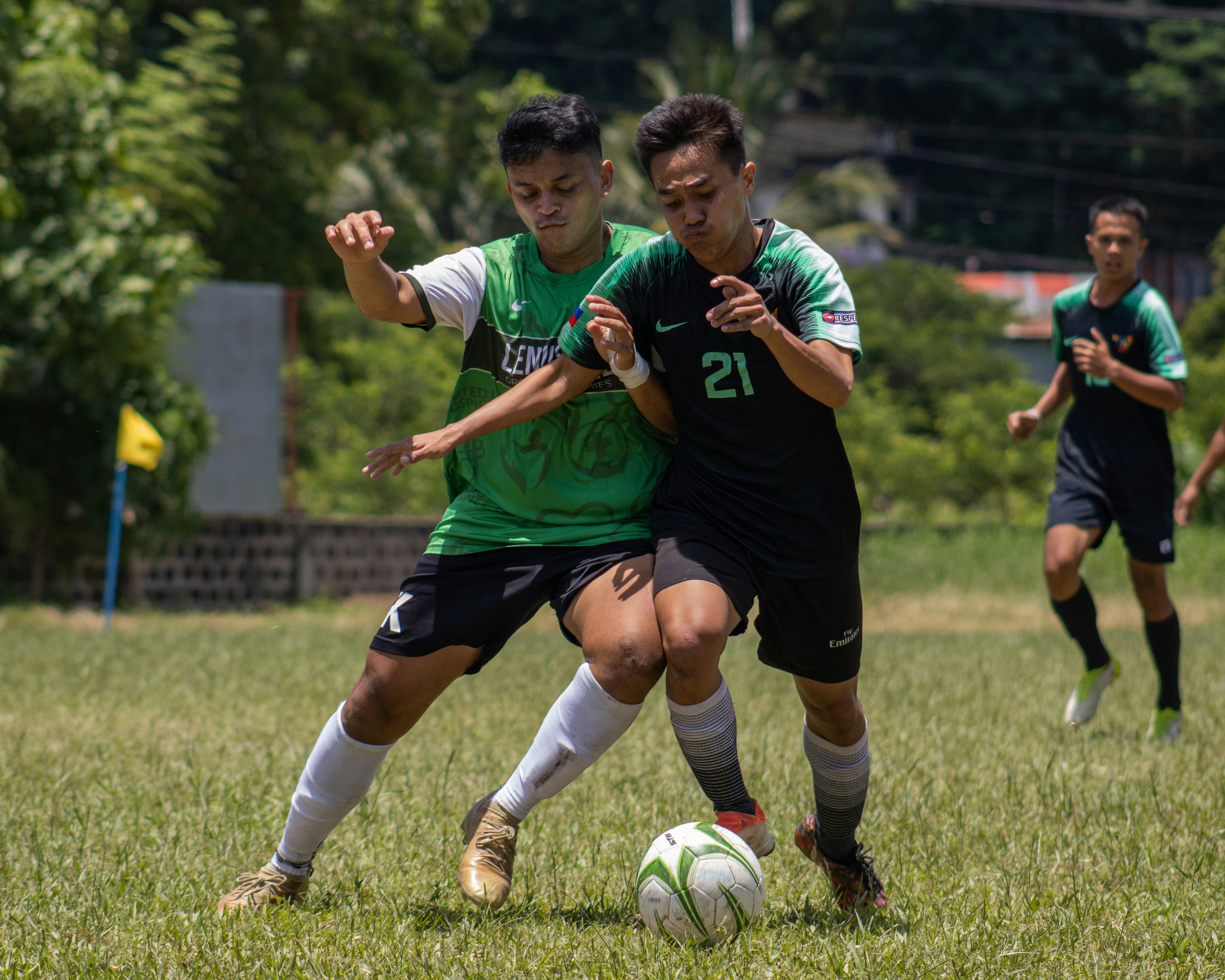 a group of young men playing a game of soccer
