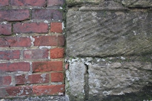 Side-by-side comparison of damaged brickwork and the same wall beautifully repaired and sealed.