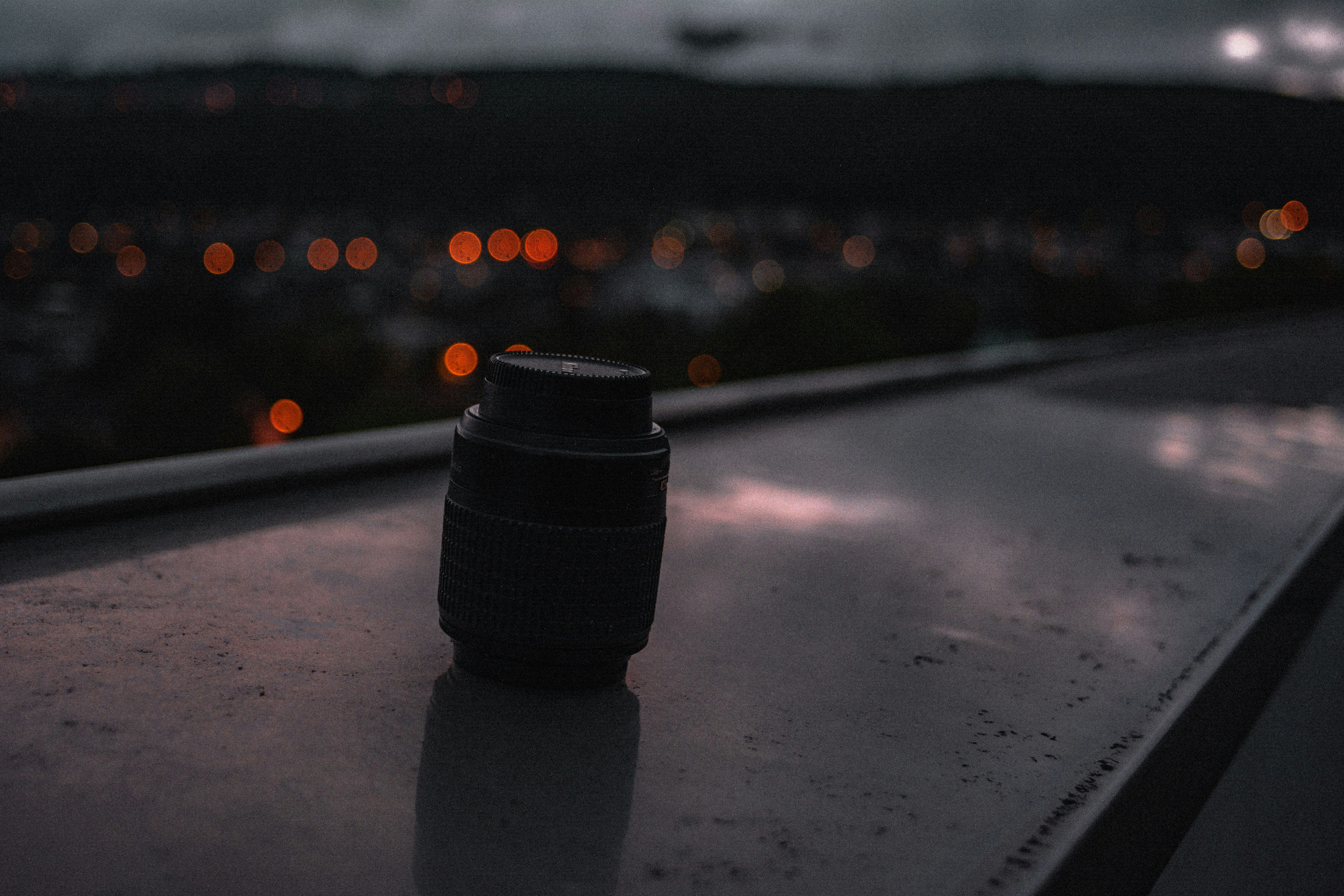a camera lens sitting on top of a roof