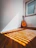 A warm, inviting therapy room with musical instruments arranged neatly, sunlight streaming through a window.