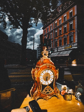 Timeless clock watches with intricate designs on a shelf.