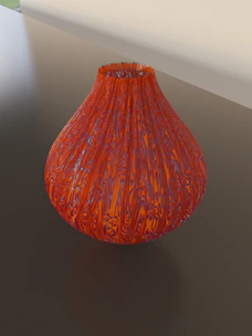 A delicate glass vase with colorful swirls catching the light.