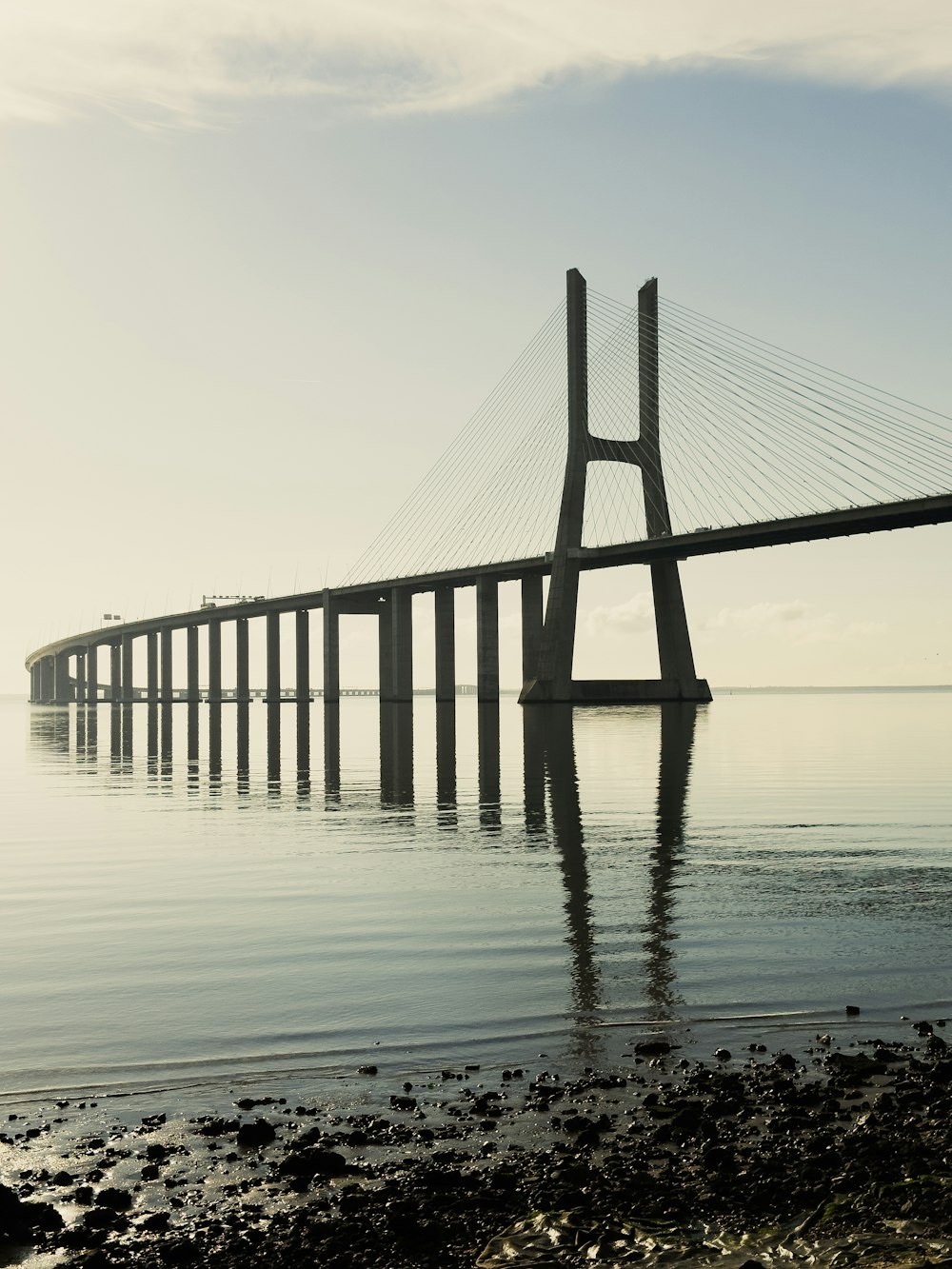 a large bridge spanning over a large body of water