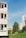 A happy resident enjoying a sunny day at Kadimia Suncrest.