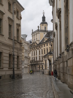 a cobblestone street in a european city