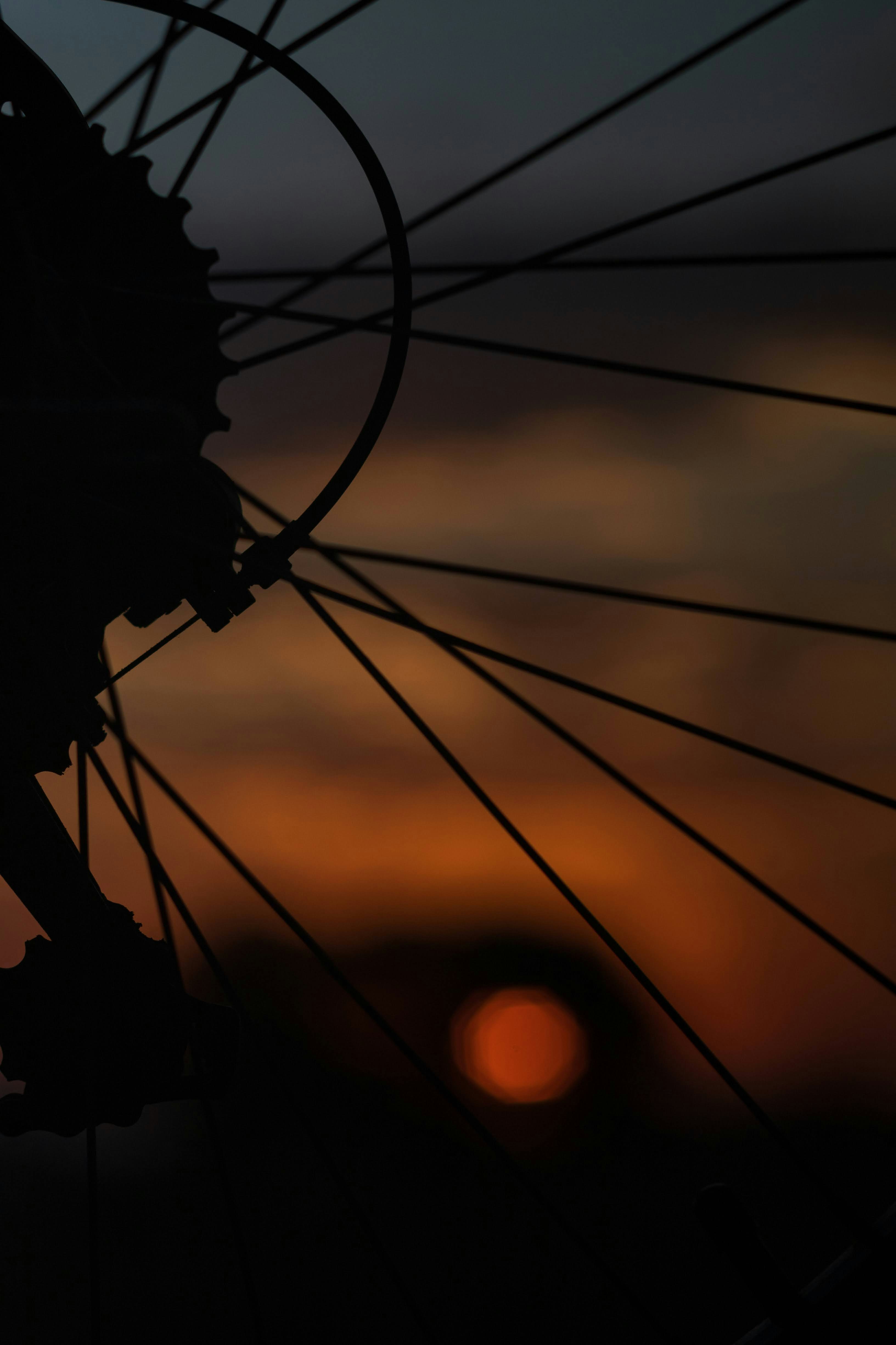 a close up of the spokes of a bicycle