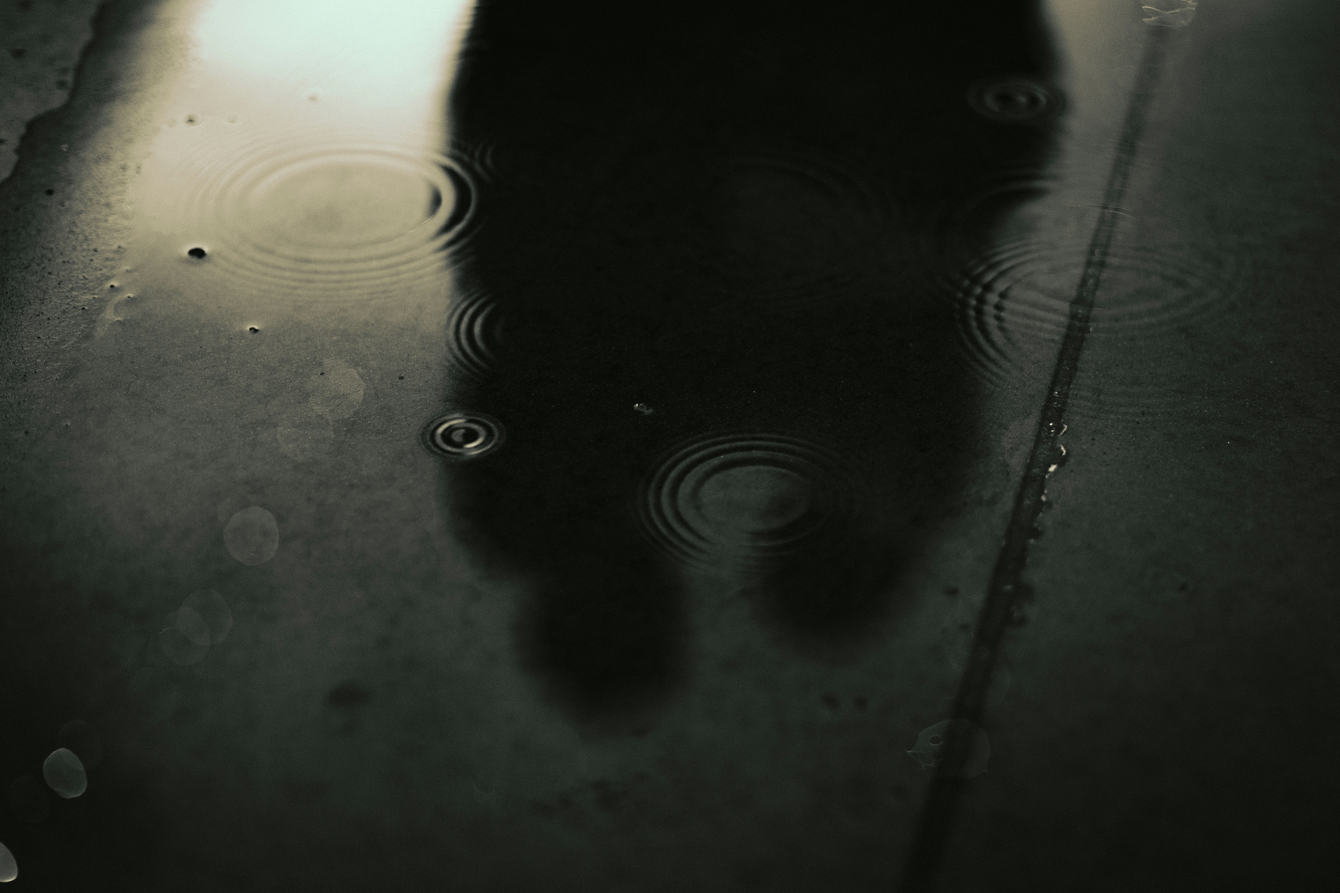 Abstract shot of couple cuddling in the rain