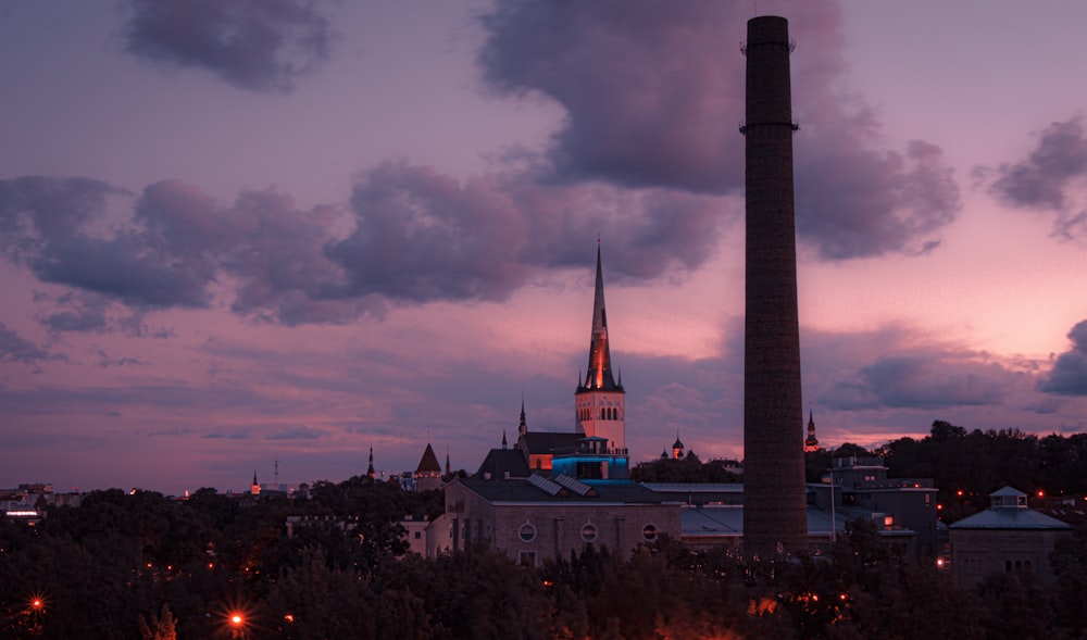 a tall tower with a clock on top of it