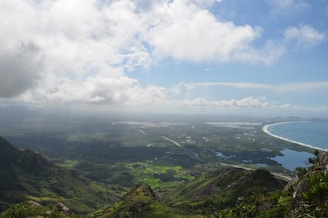 A montage of serene valleys, vibrant beaches, and iconic landmarks from around the world.