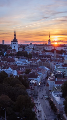 Aerial shot of the historic center of Sélestat bathed in golden sunset light.