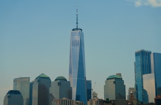 a very tall building towering over a city
