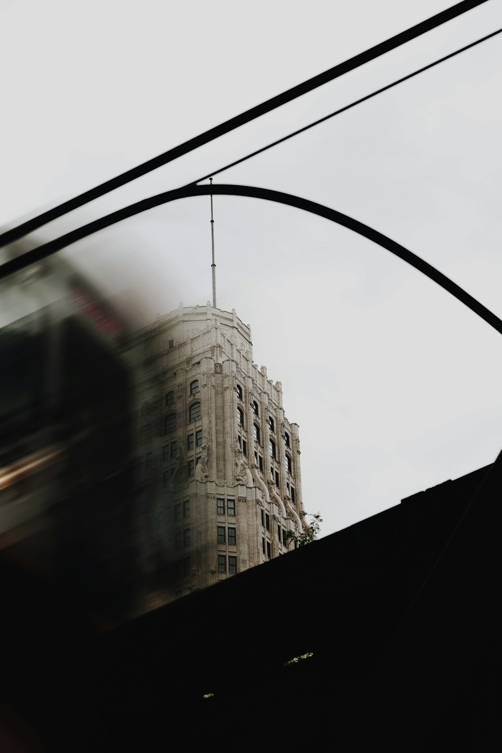 a view of a building from a train window