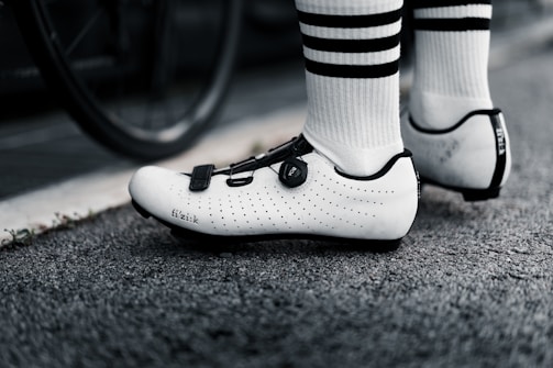 Close-up of a cyclist's foot on a pedal with pressure mapping technology.