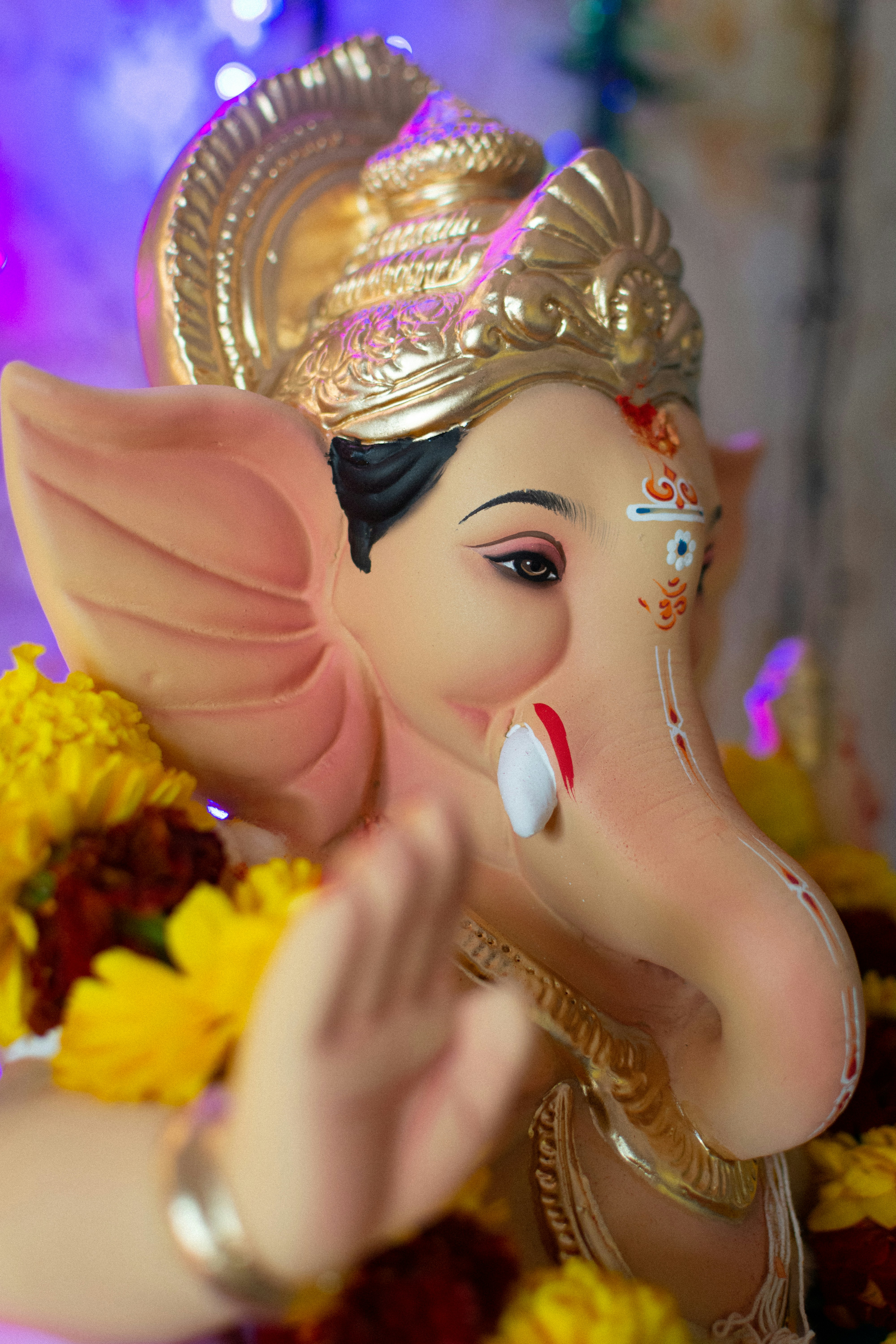 a statue of an elephant with a crown on its head