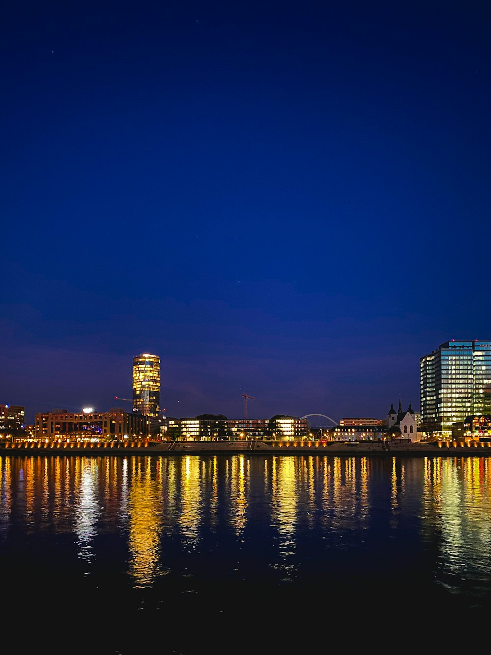 a view of a city at night from across the water