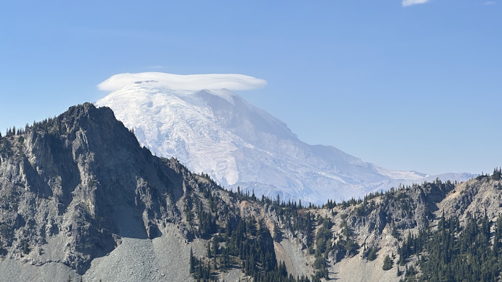 a mountain with a cloud in the sky